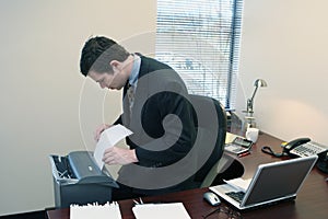 Businessman Shredding Documents