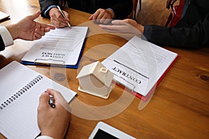 businessman sign contract agreement with realtor. buying, selling & renting real estate property