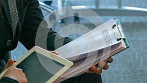 Businessman sign contract document with partner business and change in meeting conference room