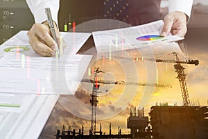 Businessman signing a building construction contract