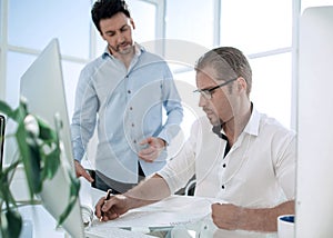 Businessman signing business documents