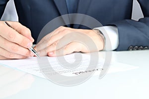 Businessman is signing a contract, business contract details