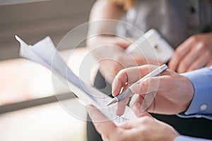 Businessman is signing a contract, business contract details