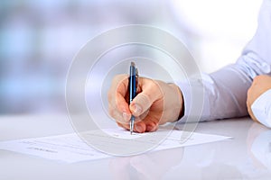 Businessman is signing a contract, business contract details