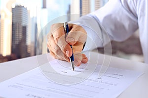 Businessman is signing a contract, business contract details