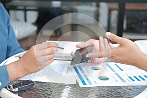 Businessman signing contract with digital pen on mobile phone. man giving electronic signature on smartphone