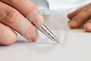 Businessman signing documents