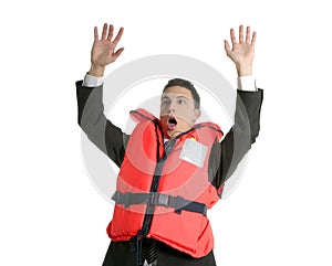 Businessman sinking in crisis, lifejacket metaphor