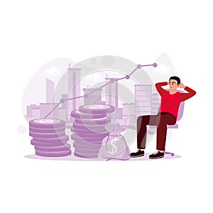 A businessman sits in a chair looking at a graph of ever-increasing money flow. Passive Income Concept.