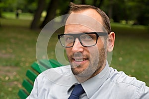 Businessman sitting on a bench