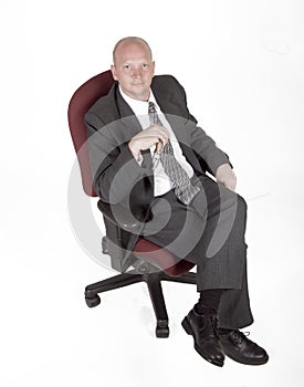 Businessman Sitting In A Chair