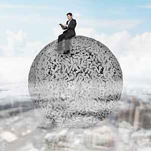 Businessman sitting on concrete ball of 3d characters big data