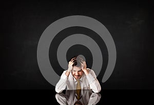 Businessman sitting at a desk