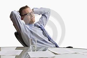 Businessman Sitting at Desk - Isolated