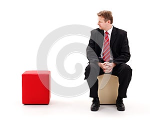 Businessman sitting lonely