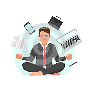 Businessman sitting in lotus position and try to relax