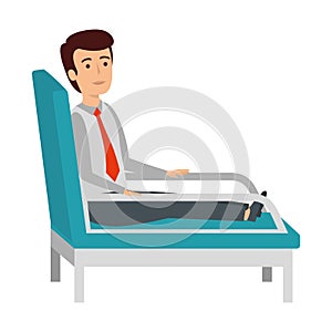 Businessman sitting in psychiatrist chair