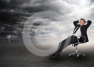 Businessman sitting in a swivel chair