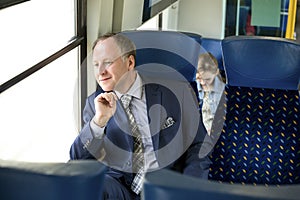 Businessman sitting in a train