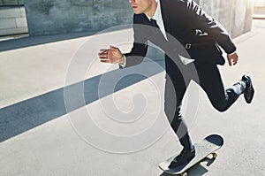 Businessman on a skateboard rushing to an assembly