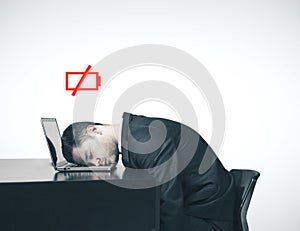 Businessman sleep at a laptop