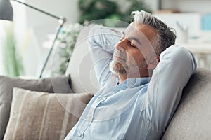 Businessman sleeping on the couch