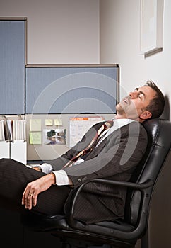 Businessman sleeping at desk