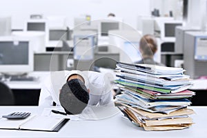 Businessman sleeping at desk