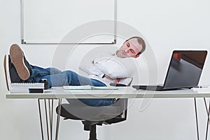 Businessman sleeping on the job at work