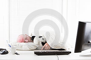 Businessman Sleeps in Office