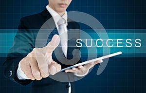 Businessman sliding on screen with SUCCESS word. Business success concept