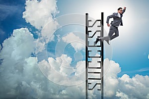 The businessman slipping from the top of ladder