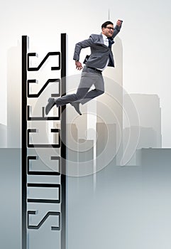 Businessman slipping from the top of ladder