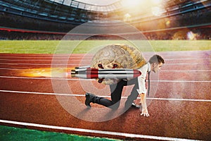 Businessman slow like a snail runs fast thanks to rockets