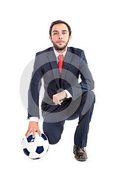 Businessman with soccer ball