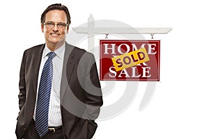 Businessman and Sold Home For Sale Real Estate Sign Isolated