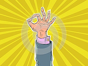 The businessman solved any problem. Help business in any situation. The hand of a man in a suit shows an ok sign. Pop