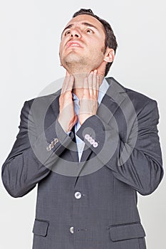 Businessman with sore throat problems