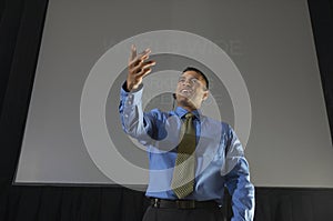 Businessman Speaking At Conference