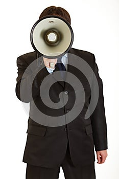 Businessman speaking into megaphone isolated