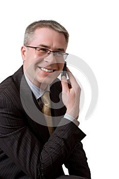 businessman speaks by phone