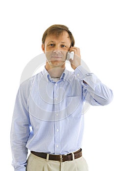 The businessman speaks by phone