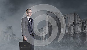 Businessman standing on apocalyptic background. Crisis, default, setback concept.