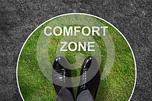 Businessman Standing In Comfort Zone Text photo