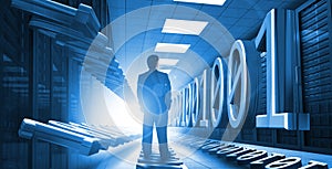Businessman standing in data center with binary code