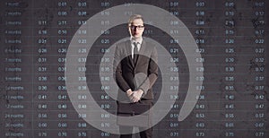 Businessman standing on a diagram background. Business, office,