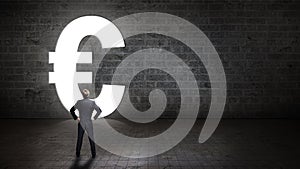 businessman standing in front of a portal shaped as euro-symbol