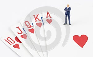 Businessman standing on the gamble card