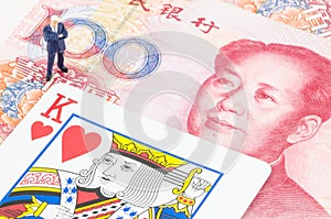 Businessman standing on the gamble card