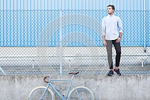 Businessman standing on the ledge